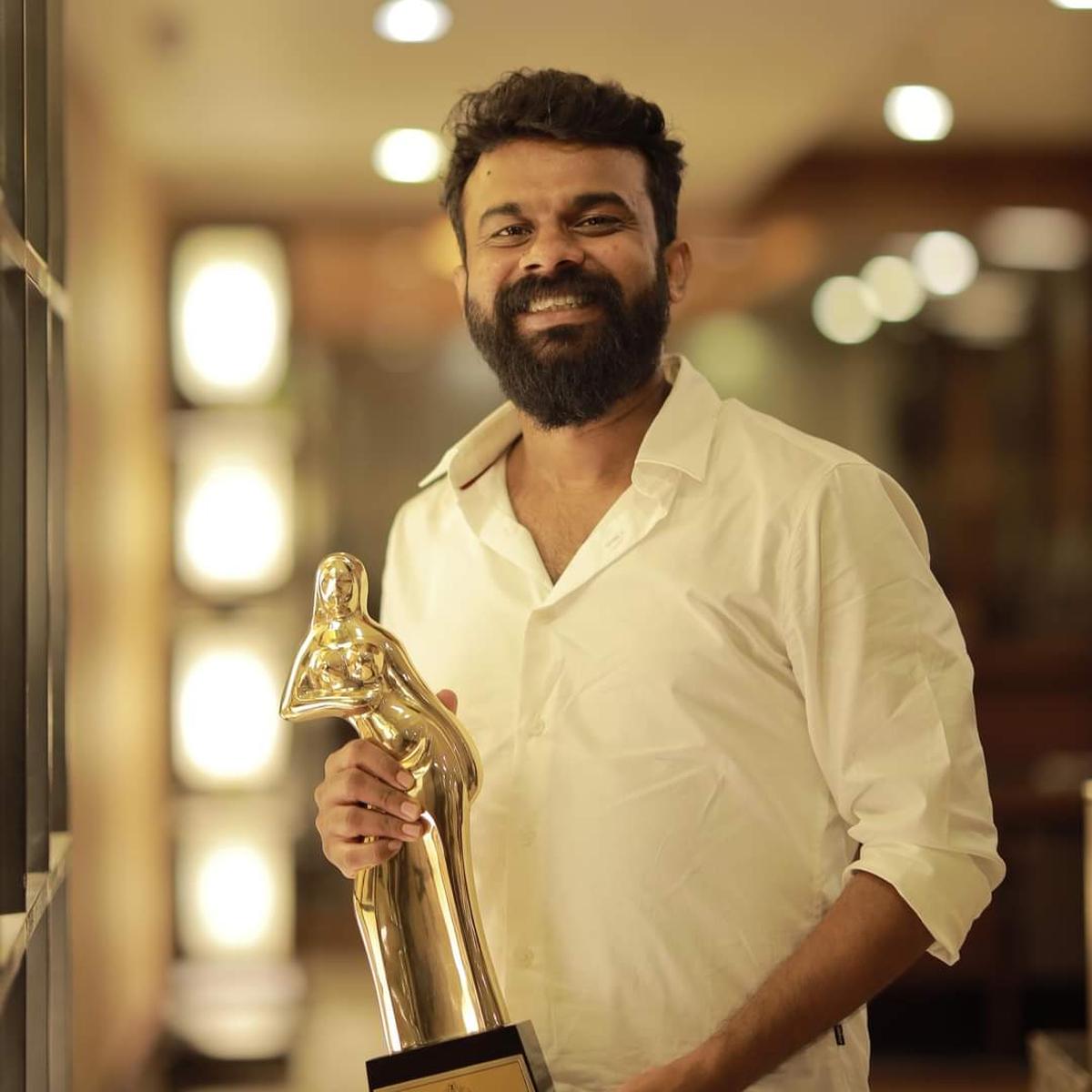 Justin Varghese with his Kerala State Film Award for the Best Background Score for Joji